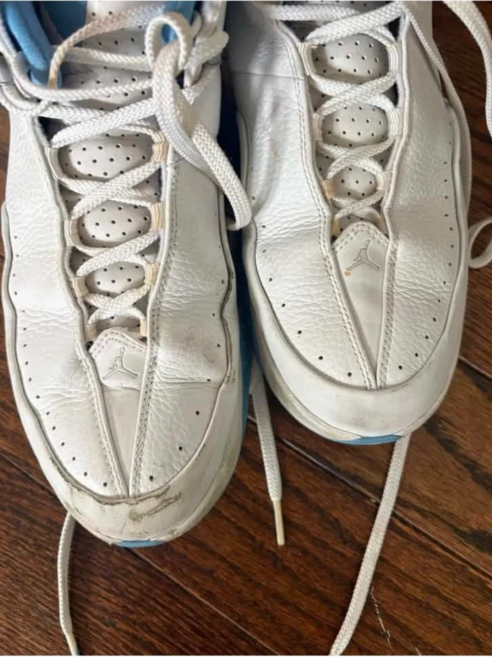 Jordan White with Light Blue High-Top Basketball Sneakers